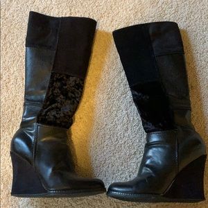 Black wedge knee high boots